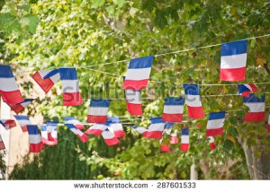 stock-photo-french-flags-garland-decorating-a-village-square-287601533